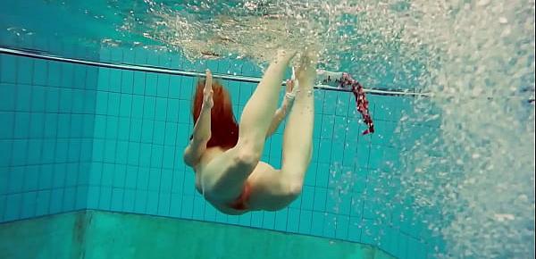  Hairy brunette teen Marketa underwater swimming